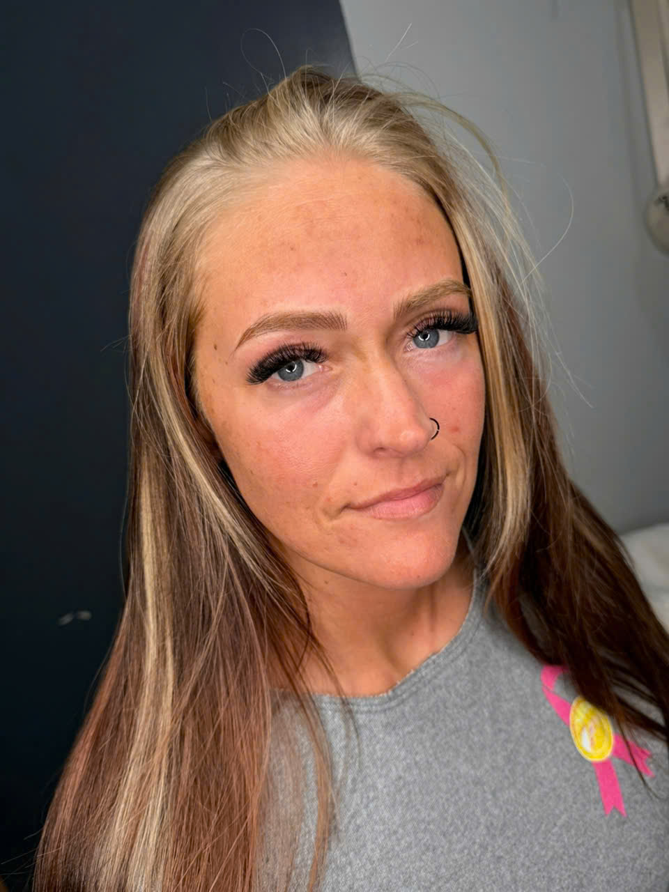 Client smiling after a lash fill at Fairy Lashes & Brows in Lumberton, TX